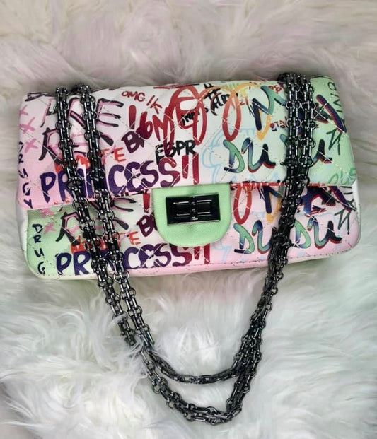 GRAFFITI CLUTCH WITH GUN METAL CHAIN